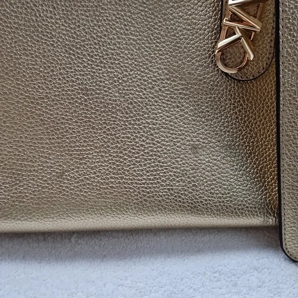 Michael Kors Shimmering  Gold Riversible Tote. - Picture 10 of 14